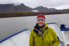 Portrait of Lena Rubensdotter on a boat outside Barentsburg, Svalbard